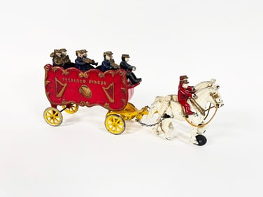 Circa teen's Kenton cast iron Overland Circus band pull toy.
