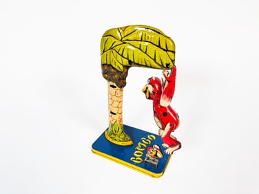 1940s-50s Unique Art Bombo the Monkey tin win-up toy.