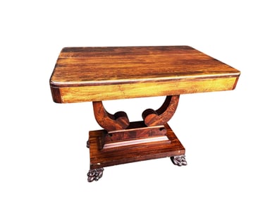 Antique American Empire mahogany game/occasional table with lyre base and claw feet.