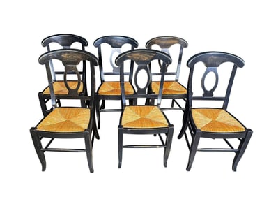 Set of six Napoli wooden dining chairs with rush seats.