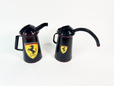 Set of two circa 1940s service department multi-fluid cans restored in Ferrari regalia.