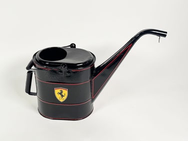 Nicely restored circa 1940s radiator service/water can restored in Ferrari regalia.