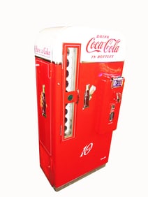 Museum-quality 1950s Coca-Cola Vendo 81 10-cent coin-operated soda machine.