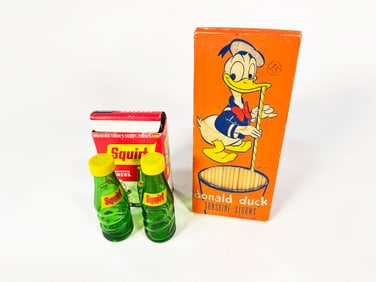 Lot consisting of 1960s Squirts Soda Salt and Pepper Shakers and 1950s Donald Duck Soda Straws
