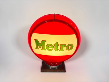 Circa 1940s Mobil Metro Gasoline gas pump globe in a Capcolite body.