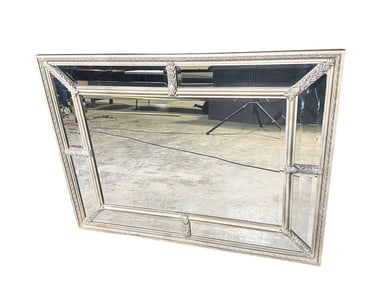 High quality decorative wood-framed mirror by Uttermost.