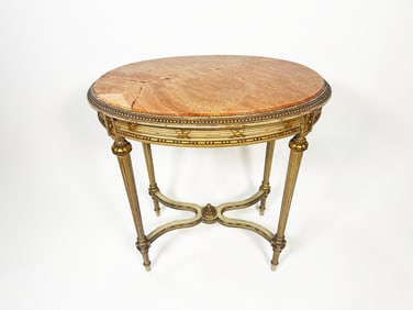 Late 19th century French Louis XVI style round side table with marble top and giltwood carving.