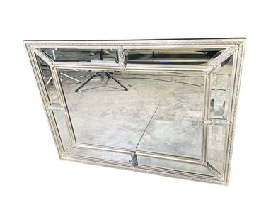 High quality decorative wood-framed mirror by Uttermost.