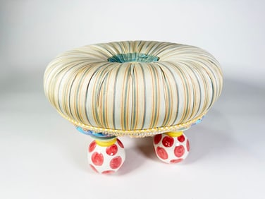 MacKenzie-Childs Lamp chop Tuffet Ottoman.