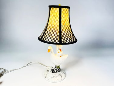 Whimsical MacKenzie-Childs Courtly Check duck lamp.