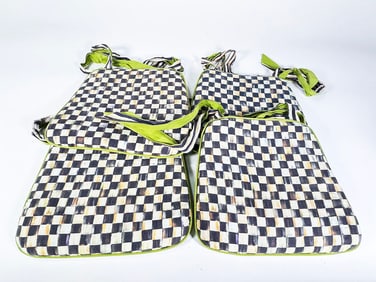 Set of 4 MacKenzie-Childs Courtly Check chair seat cushions with green ties and trim.