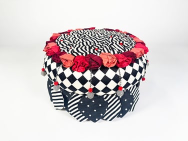 Pair of MacKenzie Childs Moonlight Garden footstool/pillow.