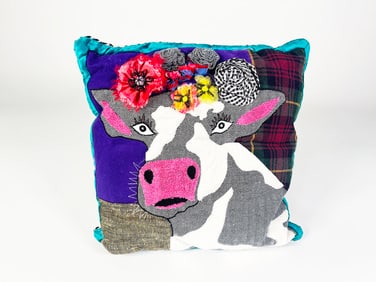 MacKenzie-Childs Frida Cowlo throw pillow.