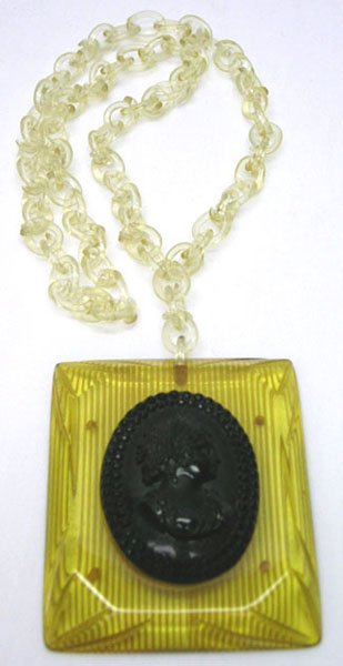 GREAT VICTORIAN STYLE CAMEO BAKELITE NECKLACE: GREAT VICTORIAN STYLE CAMEO BAKELITE NECKLACE * PENDANT MEASURES APROX. 2 1/2" WIDE X 2 3/4" TALL * CHAIN IS APROX. 22" * PENDANT IS MADE OF A TRANSLUCENT HONEY YELLOW BAKELITE WHICH IS HAND CARVED FR