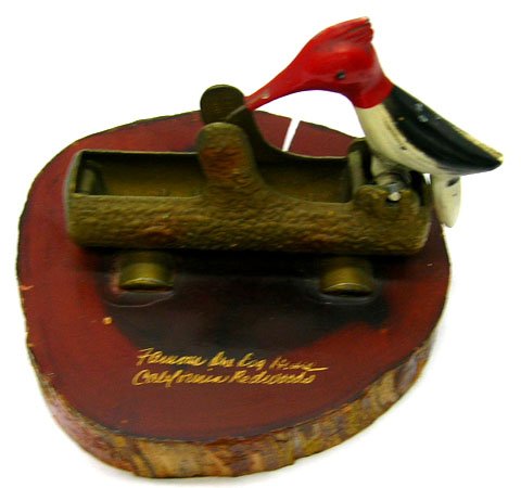 1940'S CALIF.RED WOODS MECHANICAL TOOTHPICK HOLDER: 1940'S CALIF.RED WOODS MECHANICAL TOOTHPICK HOLDER * ITEM IS APROX. 5" IN DIAMETER * IS A SOUVENIR FROM THE CALIFORNIA RED WOODS * TREE TRUNK HOLDS TOOTHPICKS * BIRD SPRINGS DOWN TO PICK UP TOOTHPICK 