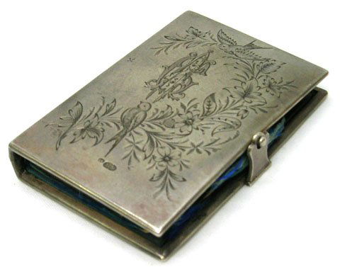 ELABORATE 1897 RUSSIAN SILVER LADIES PURSE: ELABORATE 1897 RUSSIAN SILVER LADIES PURSE * MEASURES APROX. 2 1/4" WIDE X 3" TALL * LATCH AND PURSE IS HALLMARKED BK 84 WITH CROSSED HAMMERS IN TOUCH MARK * WHEN OPENED, REVEALS A SMALL NOTEBOOK AND