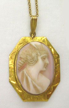 VINTAGE CORAL CARVED CAMEO GOLD LADIES NECKLACE: VINTAGE CORAL CARVED CAMEO GOLD LADIES NECKLACE * CAMEO IS APROX 1" TALL X 3/4" WIDE * IS MADE OF PINK CORAL MOUNTED IN 10K GOLD FRAME * MARKED ON LOOP 10K * WEIGHS APROX. 3.4 GRAMS * PETITE CHAIN IS 