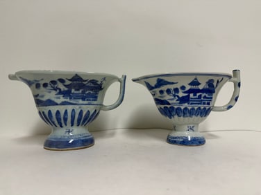 Chinese blue and white porcelain landscaoe cup with holder.