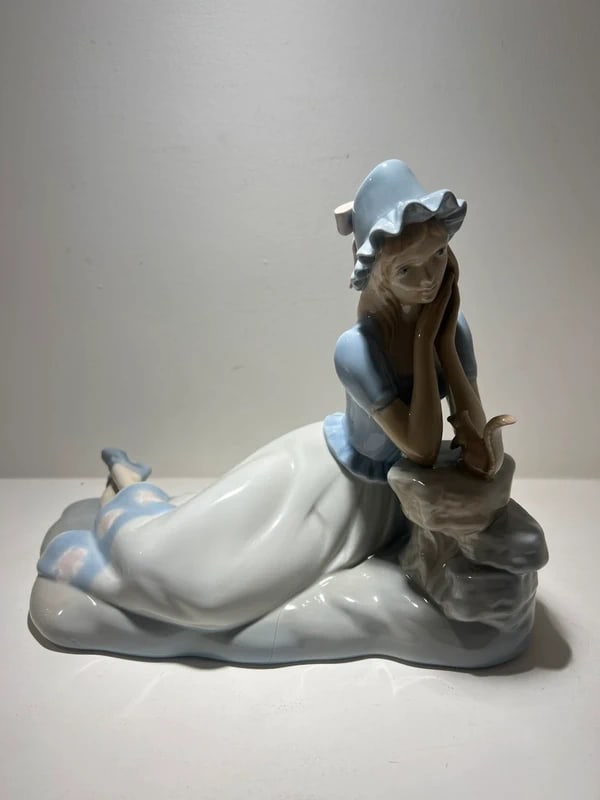 Nao by Lladró piece titled "Listening to the Bird's Song" (1 of 2)