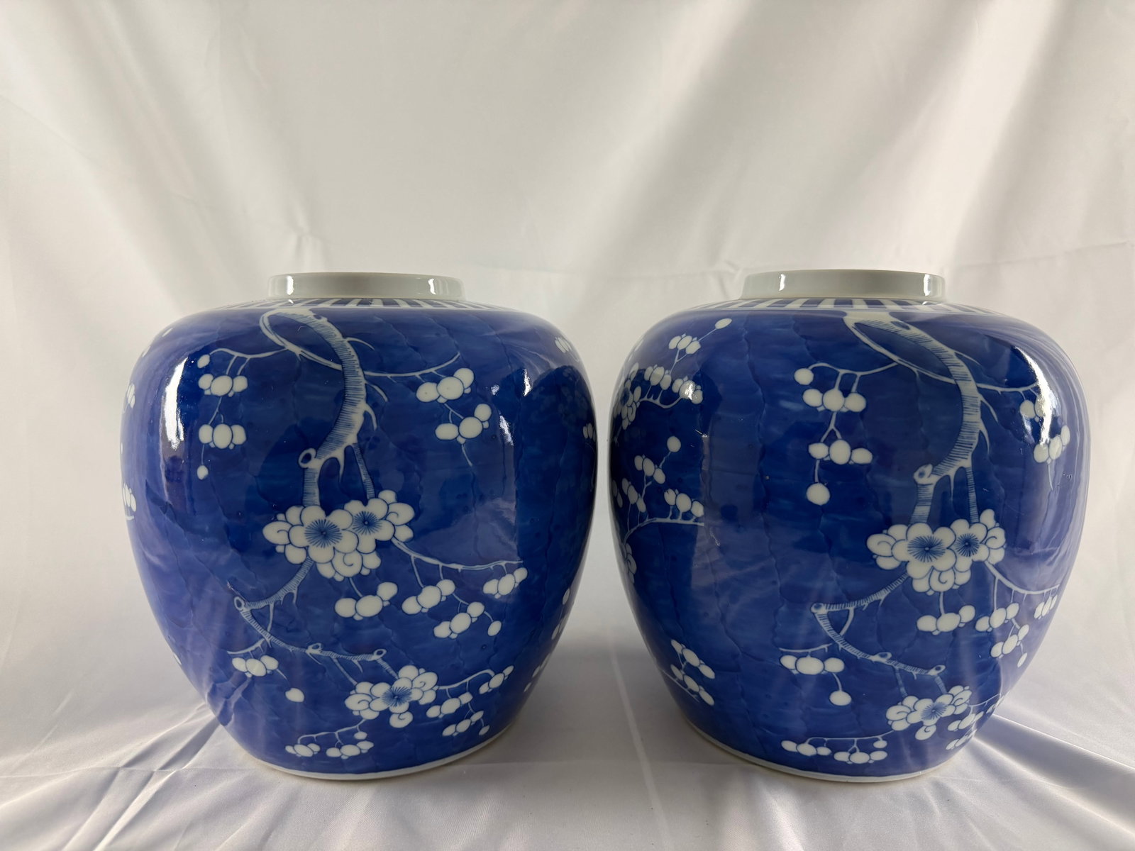 Pair of Chinese blue and white plum bossom porcelain jars: Size: tall 8.5 inches/ 21.8 cm. Provenance: From Elkton MD collector. We can offer Affordable, Reliable packing and shipping to all over the world for most items, generally save 10% than most shipper 