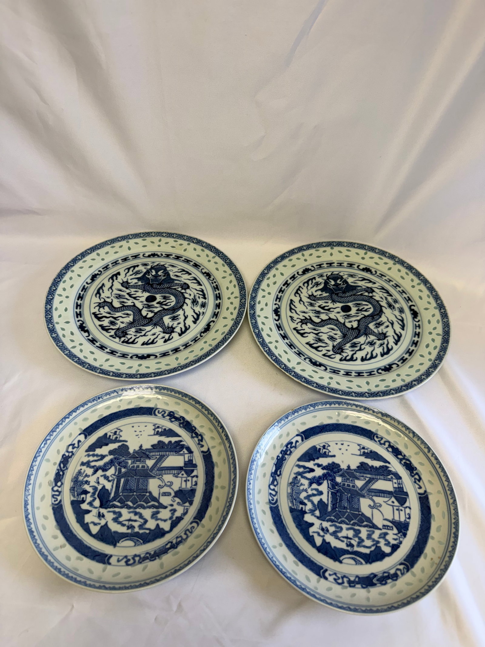 Set Of 4 Chinese Blue And White Dragon And Landscape Porcelain Plates: Size: 7.5-9 inch. Provenance: From Hockessin DE collector. Preview Day: Preview open On Jun 13th Sat 10AM-4 PM, welcome. We can offer Affordable, Reliable packing and shipping to all over the world fo