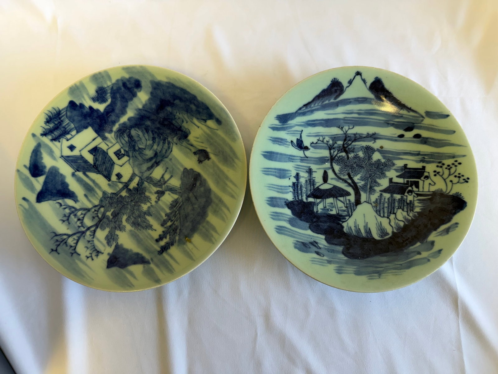 Set of 2 Chinese green glazed blue and white landscape plates: Size: 10.5 inch. Provenance: From Christiana DE collector. Preview Day: Preview open On Sep 5th Sat 10AM-4 PM, welcome. We can offer Affordable, Reliable packing and shipping to all over the world for