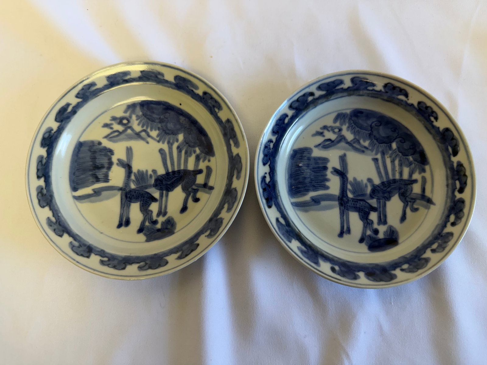 Pair of Chinese Blue And White wan li and plates: Size: 5.8 inch. Provenance: From Allentown PA collector. Preview Day: Preview open On Sep 5th Sat 10AM-4 PM, welcome. We can offer Affordable, Reliable packing and shipping to all over the world for m
