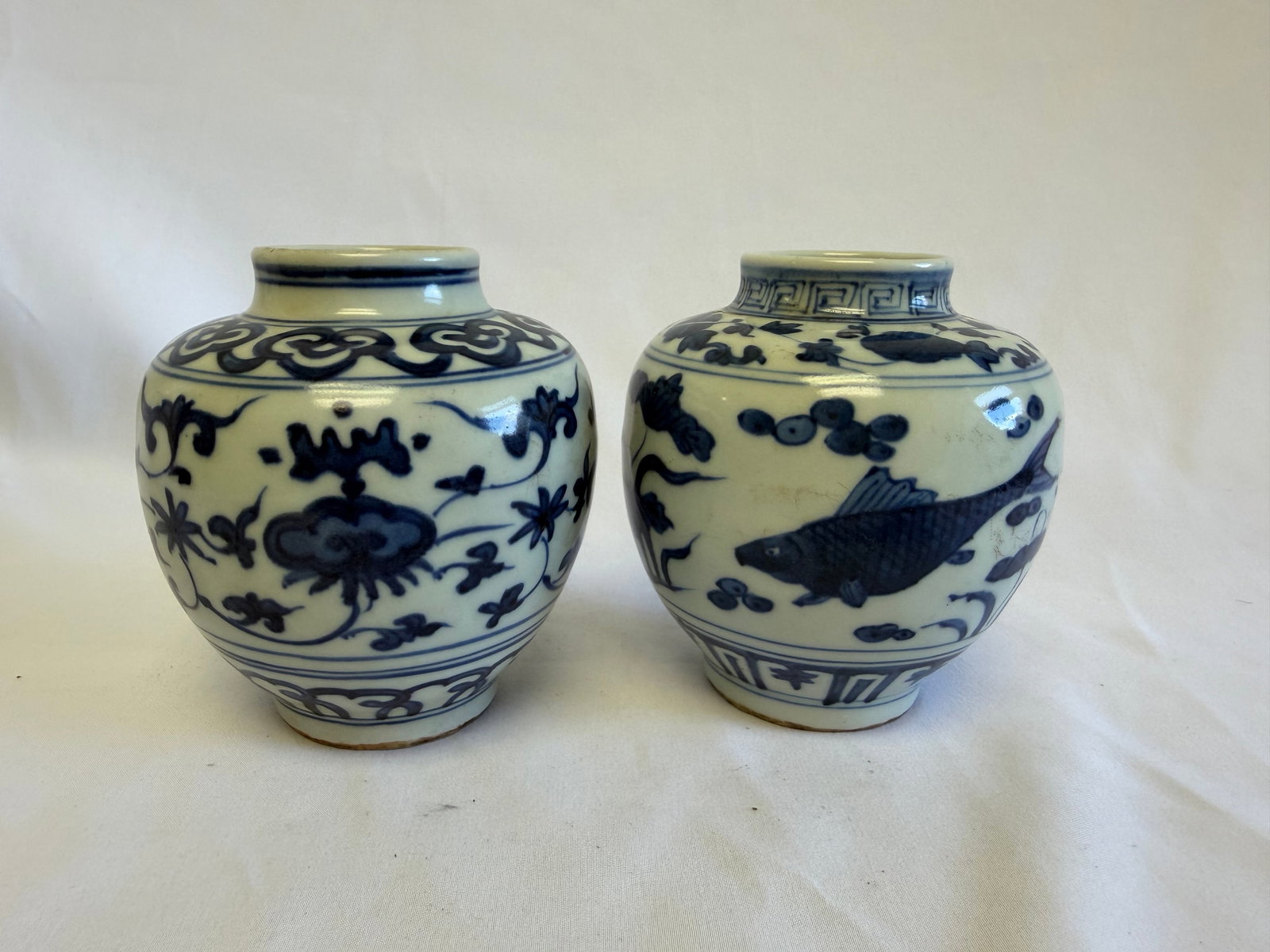 Set of 2 Chinese Blue And White lotus and fish Porcelain China jars: Size: 4.5 inch. Provenance: From Allentown PA collector. Preview Day: Preview open On Sep 5th Sat 10AM-4 PM, welcome. We can offer Affordable, Reliable packing and shipping to all over the world for m