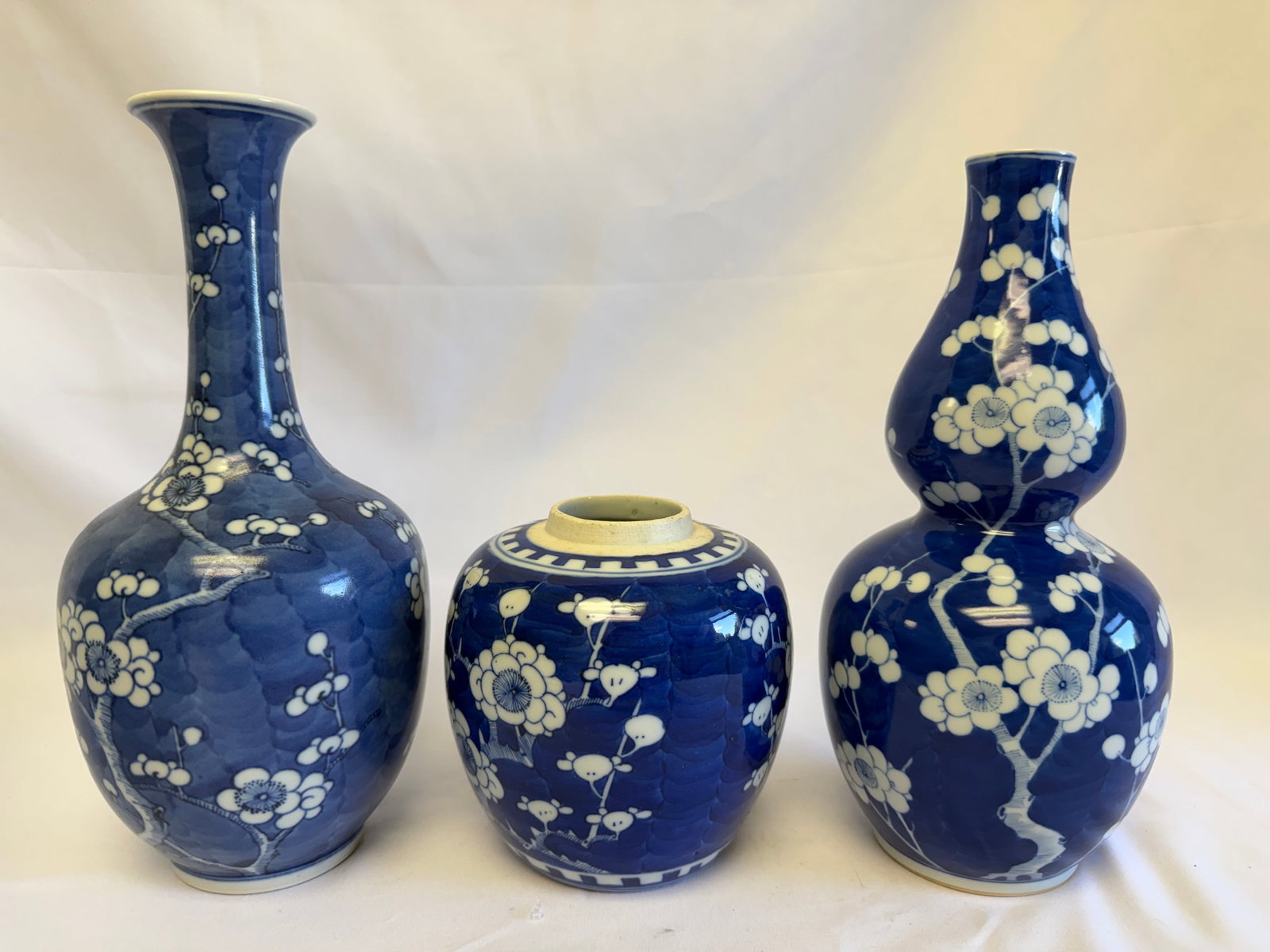 Set of 3 Chinese blue and white plum Porcelain vases: Size: 5.25-10.5 inch. Provenance: From West Chester PA collector. Preview Day: Preview open On Sep 5th Sat 10AM-4 PM, welcome. We can offer Affordable, Reliable packing and shipping to all over the wo