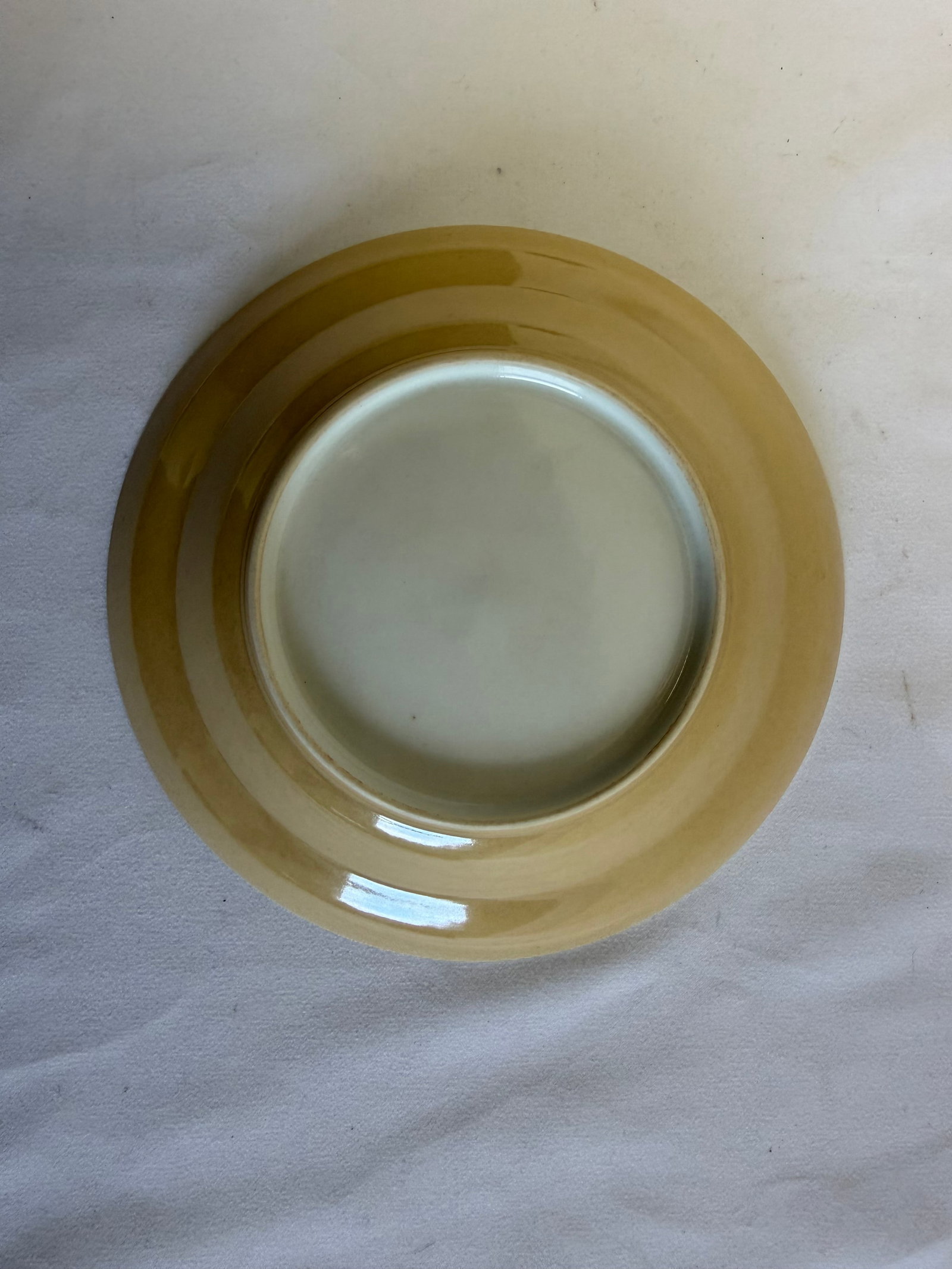 Chinese yellow glazed porcelain plate: Size: 5.7 inch. Provenance: From West Chester PA collector. Preview Day: Preview open On Sep 5th Sat 10AM-4 PM, welcome. We can offer Affordable, Reliable packing and shipping to all over the world fo