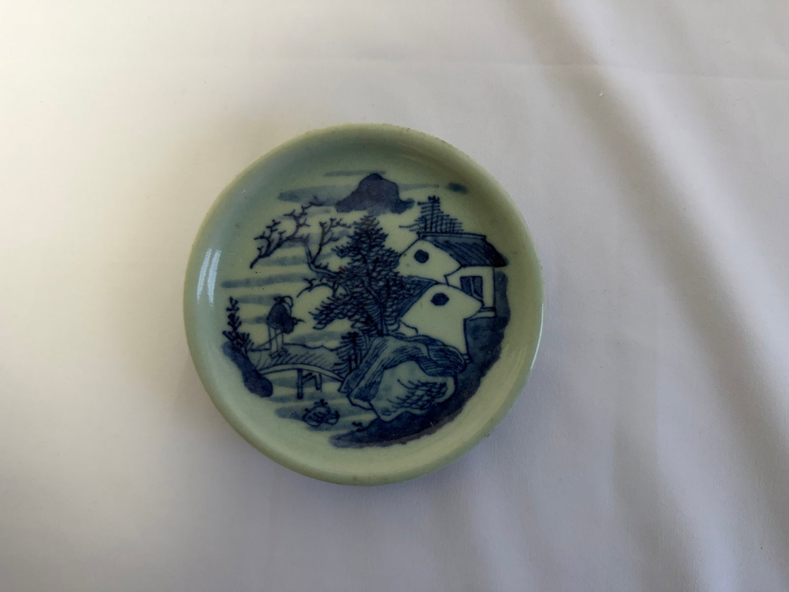 Chinese Green Glazed blue and white Plate blue and white mark: Size: 4.7 inch. Provenance: From West Media PA collector. Preview Day: Preview open On Sep 5th Sat 10AM-4 PM, welcome. We can offer Affordable, Reliable packing and shipping to all over the world for 