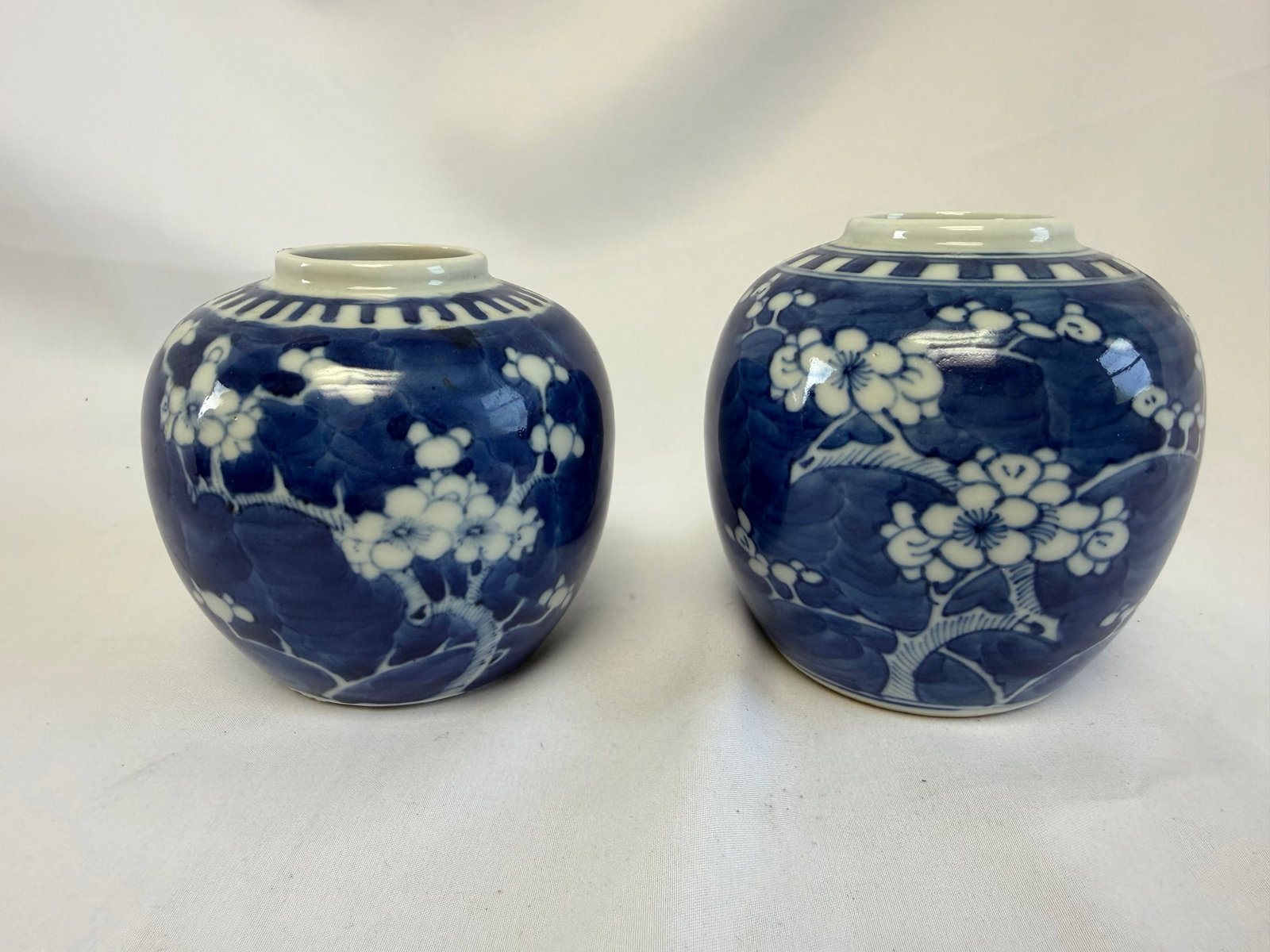 Pair of Chinese blue and white plum Porcelain jar: Size: 3.5-4 inch. Provenance: From West Wilmington DE collector. Preview Day: Preview open On Sep 5th Sat 10AM-4 PM, welcome. We can offer Affordable, Reliable packing and shipping to all over the wor