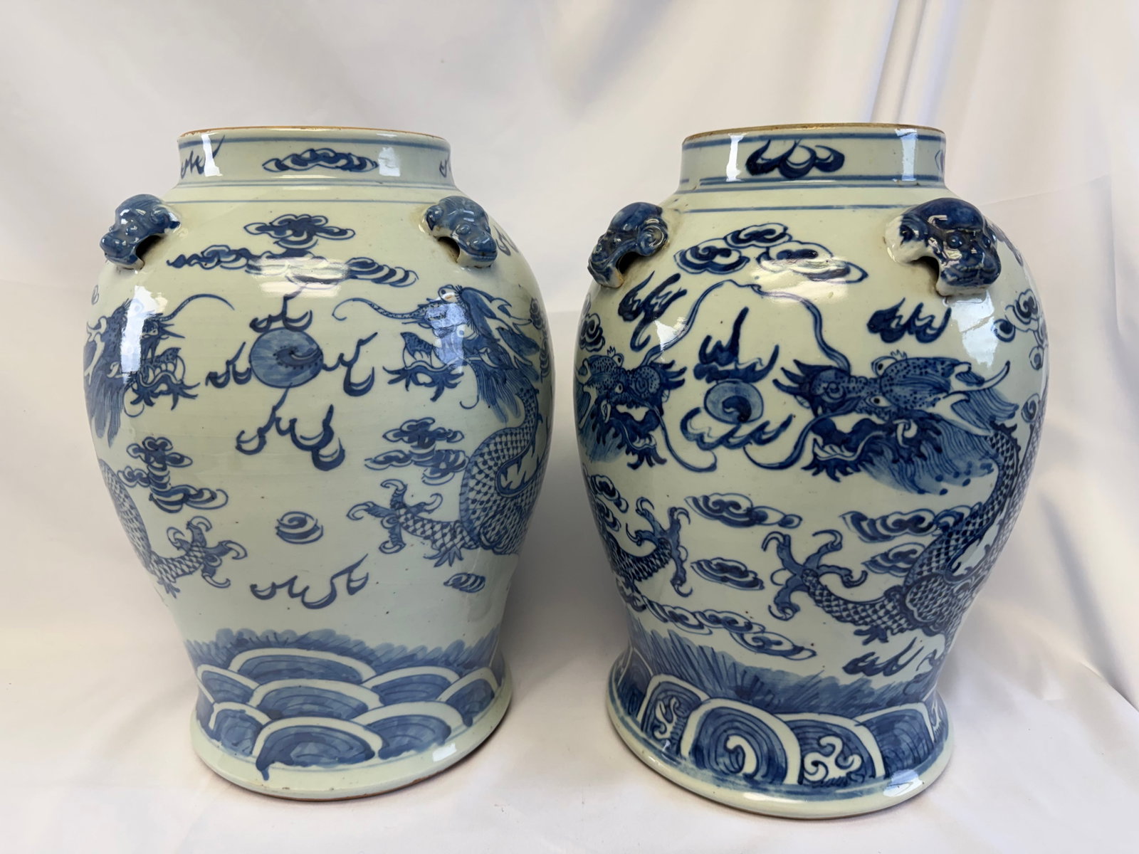 Pair of Chinese Blue And White dragons Porcelain China jars: Size: 14.5 inch. Provenance: From Seaford DE collector. Preview Day: Preview open On Sep 5th Sat 10AM-4 PM, welcome. We can offer Affordable, Reliable packing and shipping to all over the world for mo