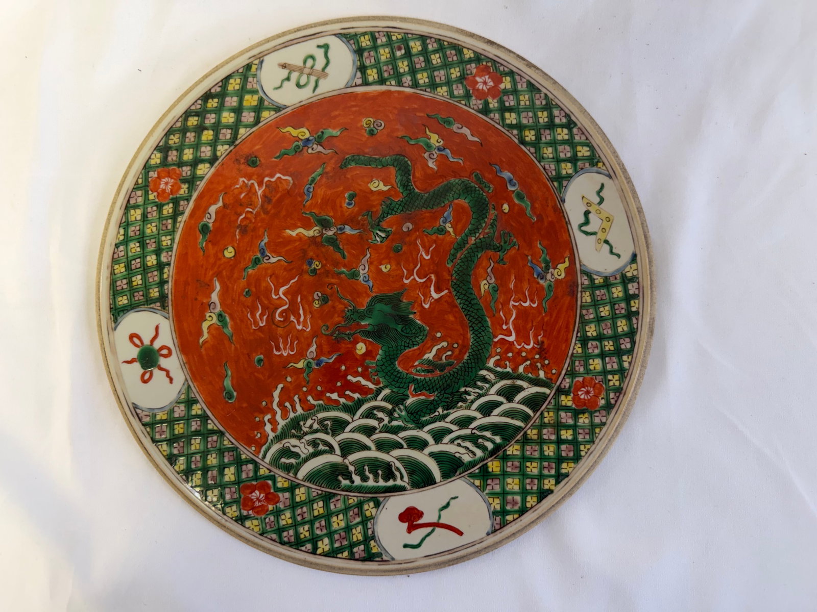 Chinese famille rose dragon round plaque: Size: 11.2 inch. Provenance: From harrison NJ collector. Preview Day: Preview open On Sep 5th Sat 10AM-4 PM, welcome. We can offer Affordable, Reliable packing and shipping to all over the world for m