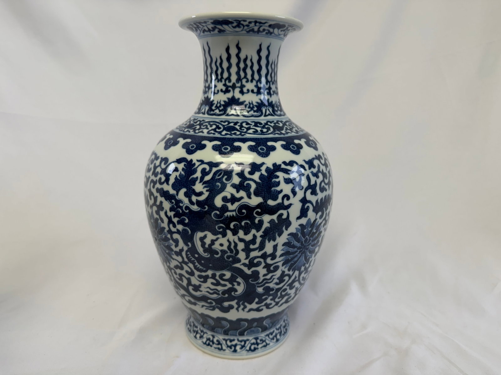 Chinese Blue And White dragon and lotus Porcelain China vase mark: Size: 11.5 inch. Provenance: From harrison NJ collector. Preview Day: Preview open On Sep 5th Sat 10AM-4 PM, welcome. We can offer Affordable, Reliable packing and shipping to all over the world for m
