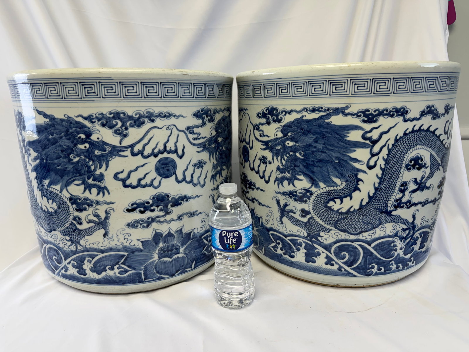 Large Pair of Chinese blue and white dragons porcelain vases: Size: 16.25x14.5 inch. Provenance: From Philadelphia PA collector. Preview Day: Preview open On Sep 5th Sat 10AM-4 PM, welcome. We can offer Affordable, Reliable packing and shipping to all over the w