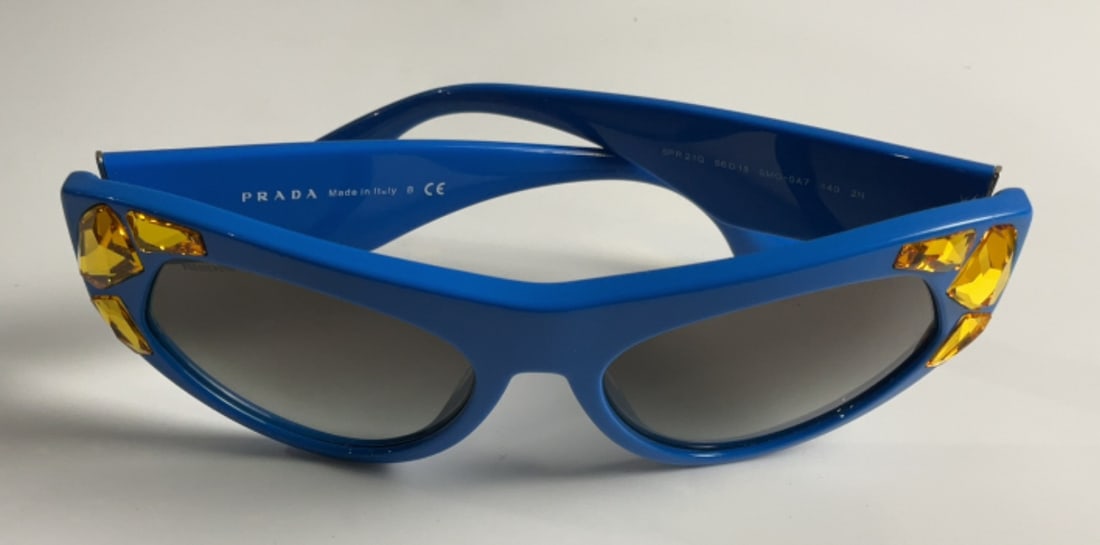 Prada Sunglasses: Buyer Premium 10% BP MFG Prada Sunglasses Located in: Chattanooga, TN *Sold As Is Where Is* 1045 F-6-C