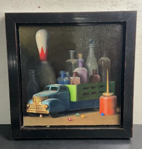 Anthony Ackrill Oil Painting "Toys": Buyer Premium 10% BP MFG Anthony Ackrill Model "Toys" Oil Painting Size (WDH) 19-7/8"x19-7/8"x2-1/4" Located in: Chattanooga, TN An original oil on board entitled "Toys" by Anthony Ackrill, in a black
