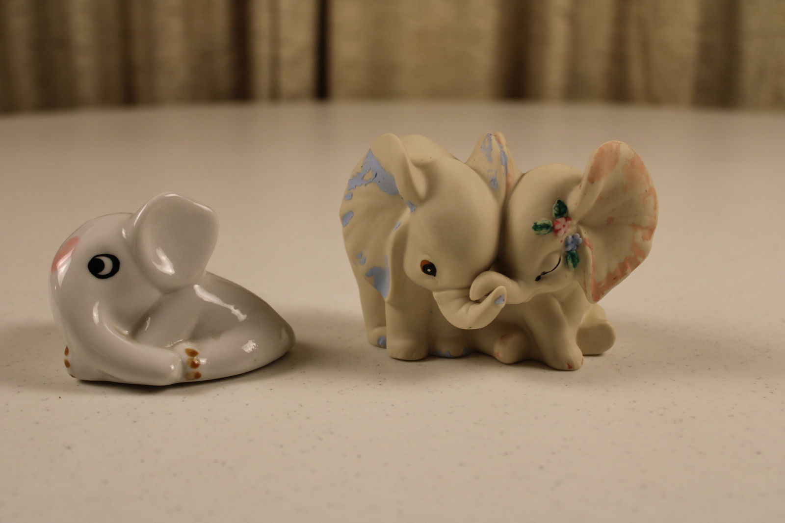 Elephant Figurines: Homco 1993 Elephants in Love Bisque Figurine Boy and Girl Elephant pair, some paint flaking that was added, any cleaning or removal is at the buyer’s discretion. Hard to find porcelain baby elephant