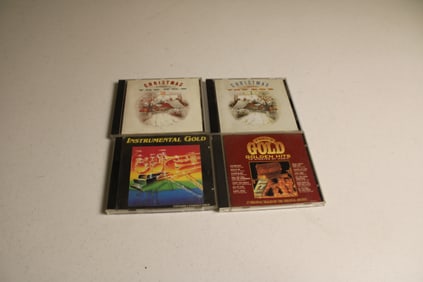 4 Assorted CDs