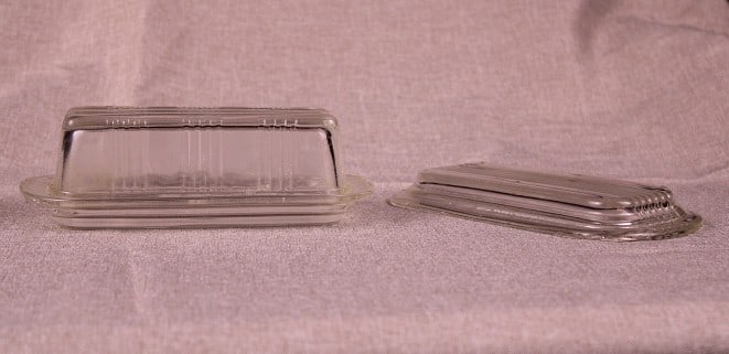 MidCentury Butter Dish: Clear glass midcentury butter dish with spare base, some chips on spare base
