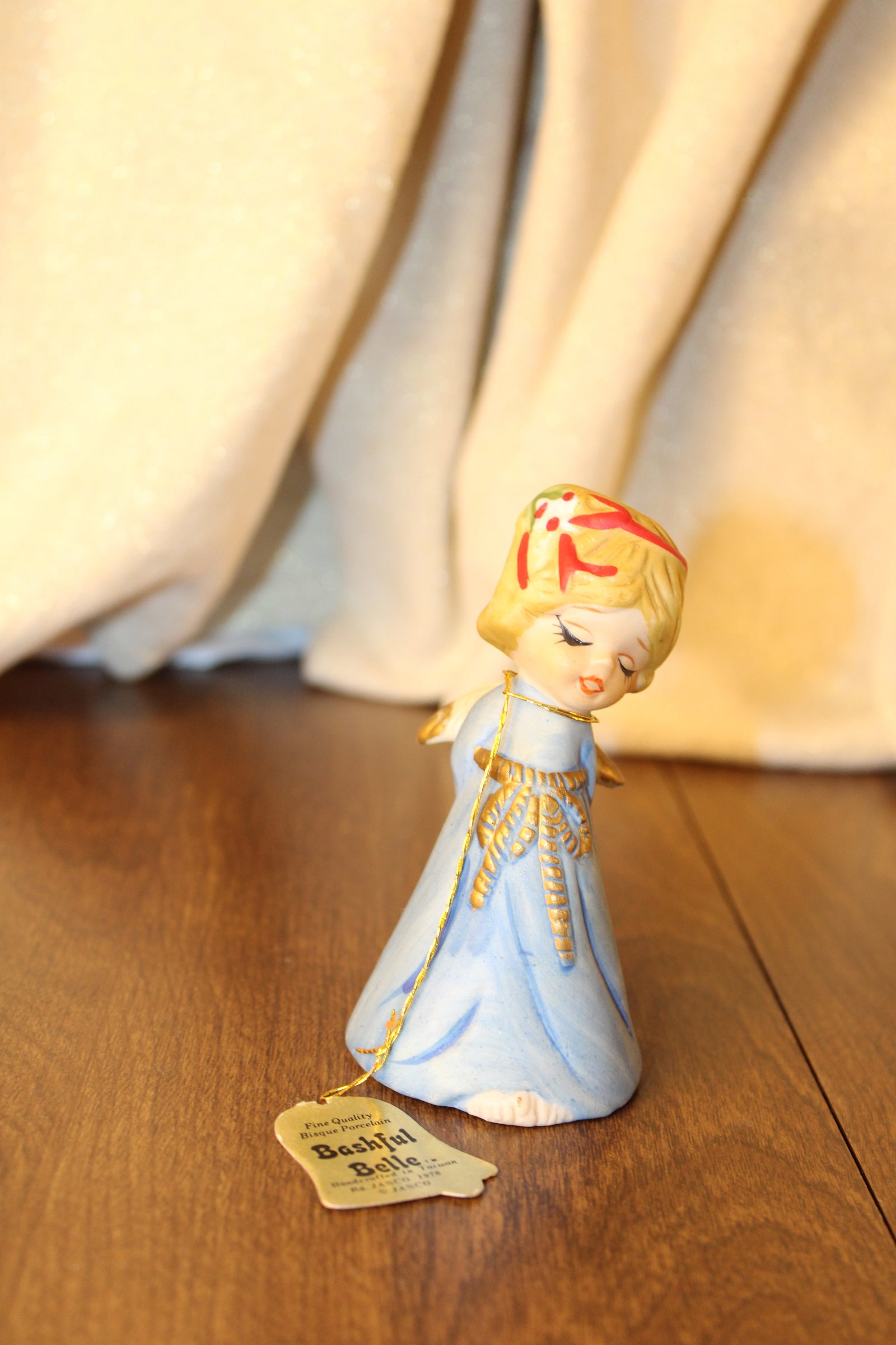 Vintage Collectible Merri-Bells: Merri-Bells Mrs. Claus has some chips on paint commensurate with age, original label says “Your Merri-Bell is excellence in fine bisque porcelain achieved by artisans applying their ancient craft he