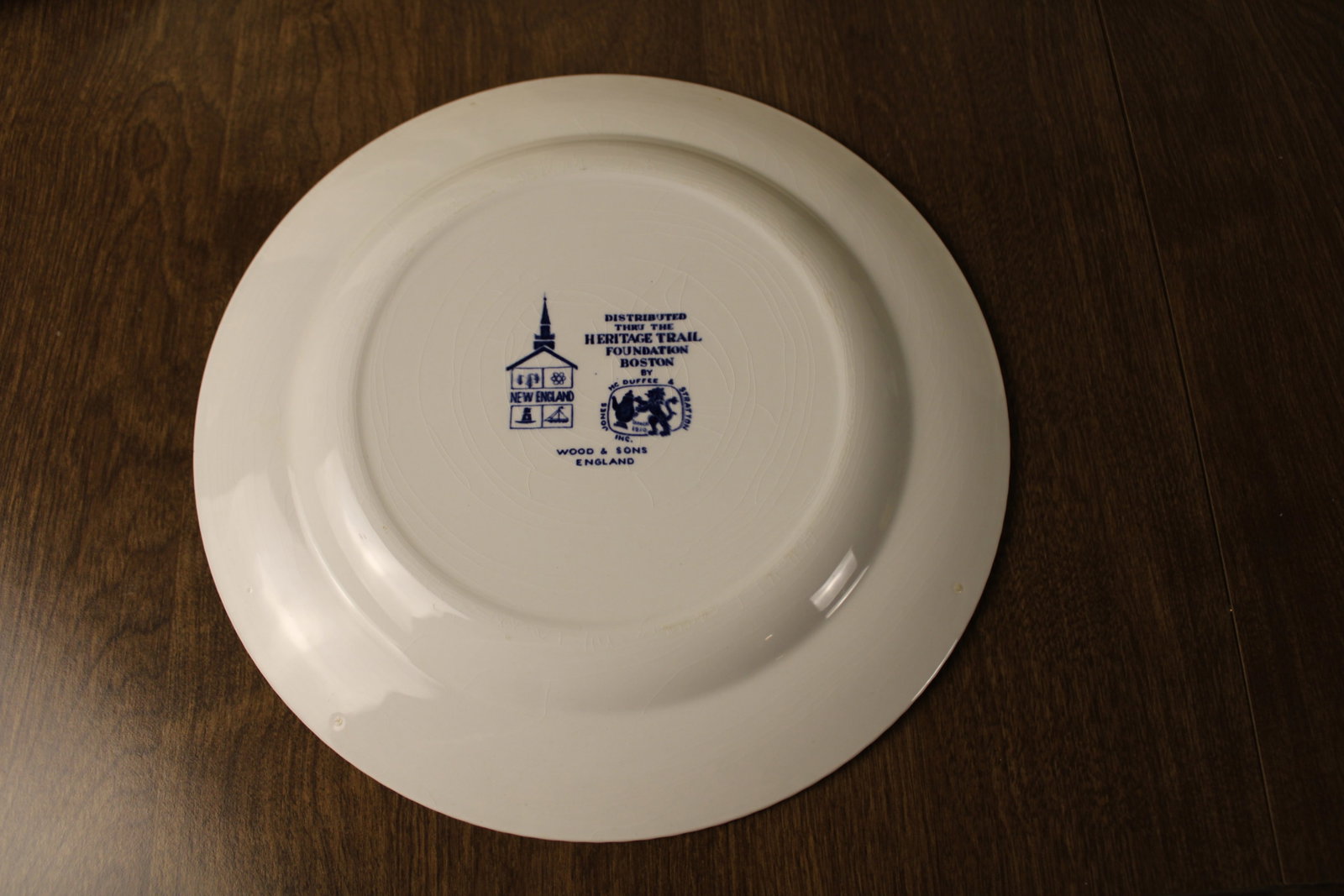 Blue And White Decorative Plates: Blue And White Decorative Plates Nubble Lighthouse in York Maine depicted on decorative plate with ridged edge, featuring Dutch folk art, have some small cracks visible typical of this kind of ceramic