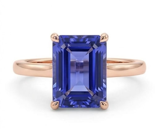Certified 3.0 Ct Emerald Natural Tanzanite 14K Rose Gold Solitaire Setting Ring: This certified fine jewelry piece features a 3.0 carat natural Tanzanite in a Emerald cut, crafted in 14K Rose Gold. The Solitaire Setting design highlights the beauty of the natural center stone. All