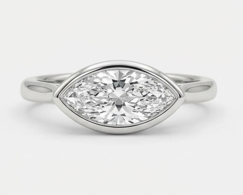 4.00 CT Lab Grown Diamond Lab-Grown Ring in White Gold: An exceptional 4.00 carat lab-grown lab grown diamond ring, expertly crafted in luxurious White Gold. The marquise cut in modern east-west bezel setting design highlights the brilliance of the lab-gro