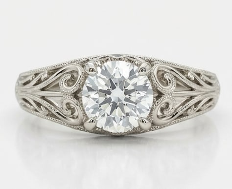 Magnificent 3.00 CT Round Brilliant Cut Lab Grown Diamond Ornate Scroll Ring in 14K White Gold: Description A 3.00 Carat Round Brilliant Cut Lab Grown Diamond is the focal point of this highly detailed vintage setting. The band and gallery are adorned with interlocking scroll patterns milgrain b