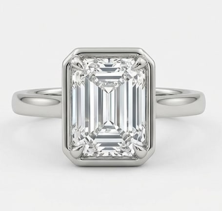 7.00 CT Lab grown diamond Lab-Grown Ring in White Gold: An exceptional 7.00 carat lab-grown lab grown diamond ring, expertly crafted in luxurious White Gold. The emerald cut solitaire in a sleek bezel setting with a plain polished band design highlights th