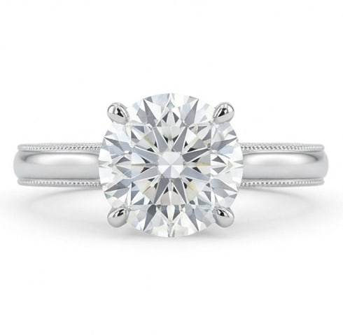 7.00 CT Lab grown diamond Lab-Grown Ring in White Gold: An exceptional 7.00 carat lab-grown lab grown diamond ring, expertly crafted in luxurious White Gold. The round brilliant cut solitaire in a 4-prong setting with a milgrain knife-edge band design high