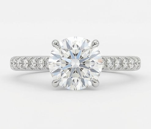 4.00 CT Lab grown diamond Lab-Grown Ring in White Gold: An exceptional 4.00 carat lab-grown lab grown diamond ring, expertly crafted in luxurious White Gold. The round brilliant cut solitaire set on a band featuring french-set pave diamonds design highligh