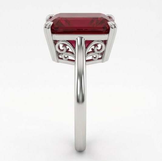 15.00 CT Ruby Lab-Grown Ring in White Gold: An exceptional 15.00 carat lab-grown ruby ring, expertly crafted in luxurious White Gold. The emerald cut solitaire with vintage scrollwork basket design highlights the brilliance of the lab-grown